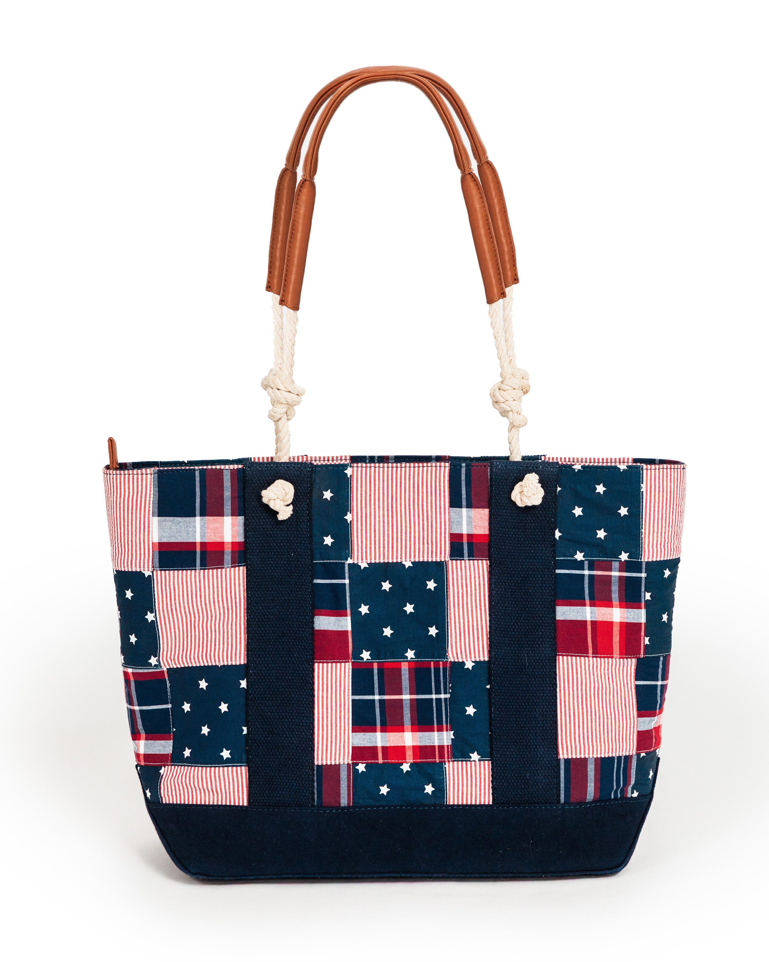 Patchwork tote bag with plaid and star pattern on a white background